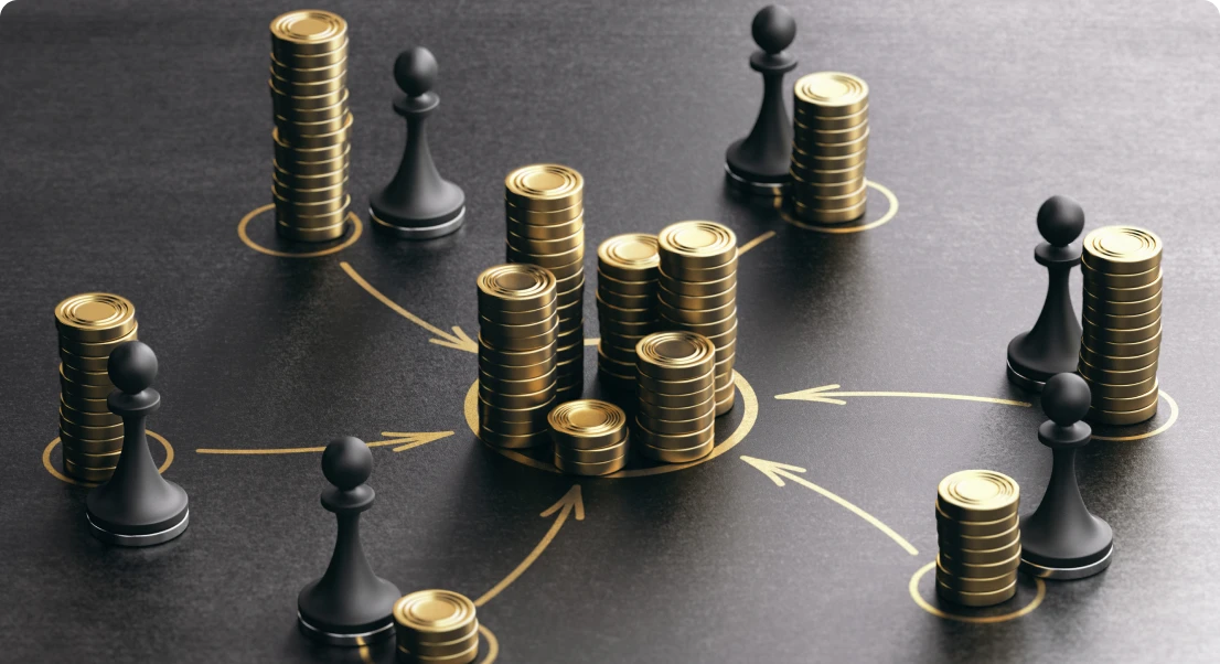 Chess pawns and coin stacks on board.